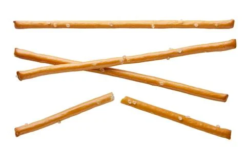 Set of salt cracker sticks and halves close-up on a white. Isolated Fotos Stock
