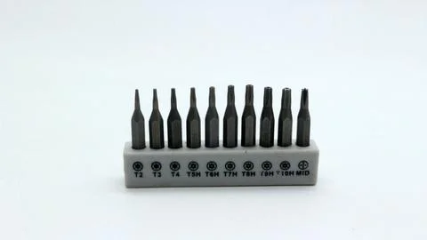 Set of screwdriver bits on a white background Stock Photos