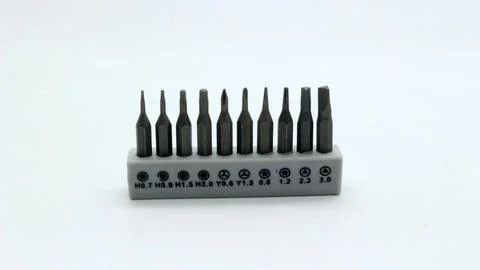 Set of screwdriver bits on a white background Stock Photos