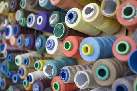 Set of sewing threads in different colors .  Selective  focus Stock Photos