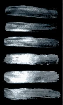 Set of silver brushes on a black Stock Illustration