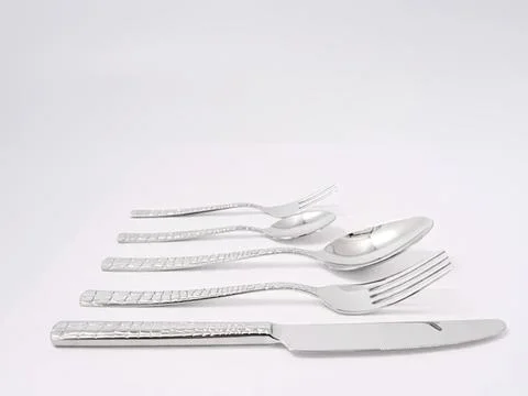 Set of silver cutlery including fork knife and spoons Stock Photos