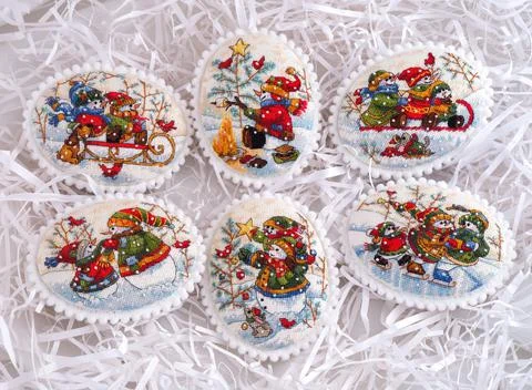 Set of six cross stitched handmade Christmas Tree ornaments. This set is embr Stock Photos