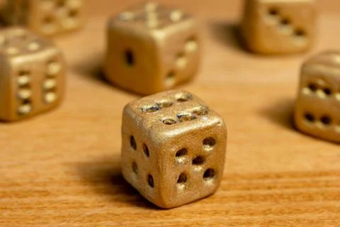 A set of six gambling dice on the table, close up. Stock Photos