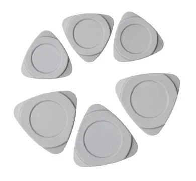 A set of six triangular shaped plastic tools Foto stock