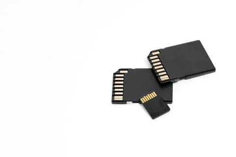 Set of small black sd memory - flash cards with copyspace on a white. Stock-Fotos