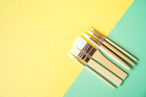 Set of small children's brushes for artwork. Minimalistic creative concept. Stock-Fotos