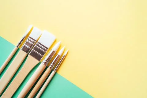 Set of small children's brushes for artwork. Minimalistic creative concept. Stock-Fotos