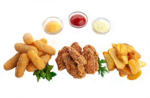 A set of snacks for beer. Composed of cheese sticks, baked potatoes and bread Stock Photos