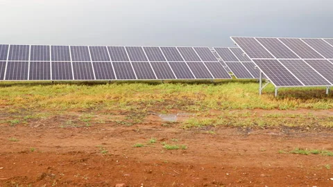 Set of solar panels located in a field Stock Footage 147458674