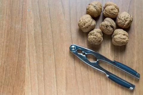 Set of some nuts and a nutcracker Stock Photos