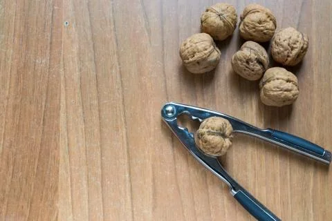 Set of some nuts and a nutcracker Stock Photos