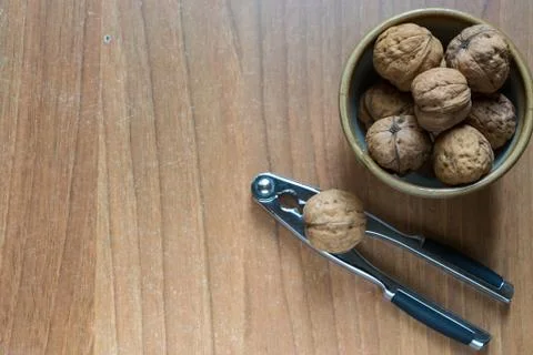 Set of some nuts and a nutcracker Stock Photos