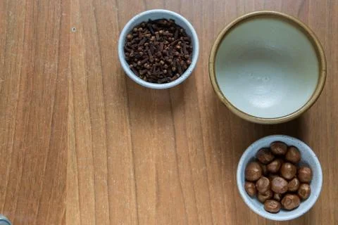 Set of some spices on a wood background Stock Photos