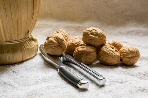 Set with some walnuts and a nutcracker Stock Photos