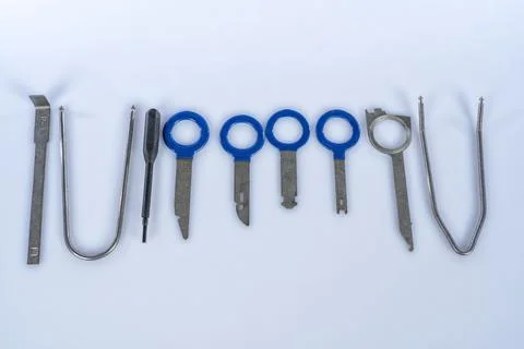 Set of special keys for disassembling stereos of different brands of cars i.. Stock Photos