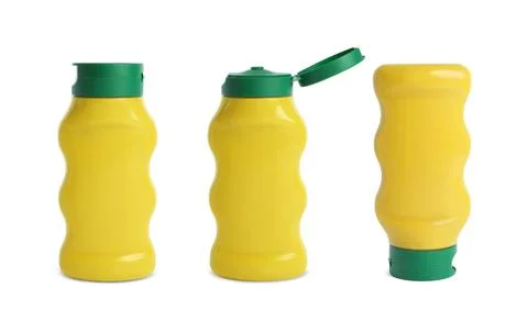 Set with spicy mustard in plastic bottles on white background Stock Photos