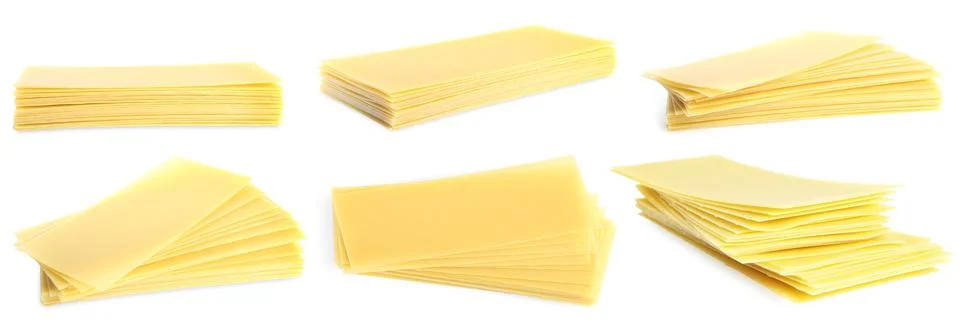 Set with stack of uncooked lasagna sheets on white background. Banner design Stockfoto's