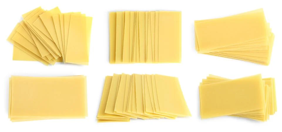 Set with stack of uncooked lasagna sheets on white background. Banner design Stockfoto's