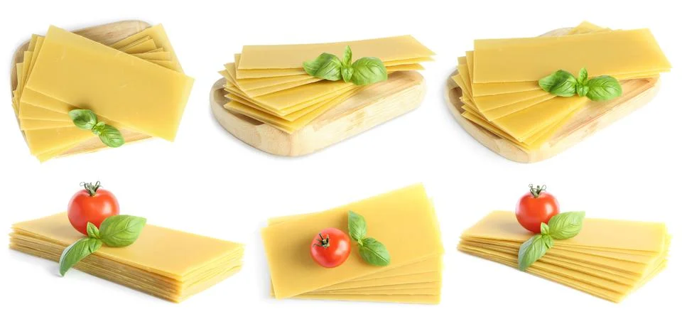 Set with stack of uncooked lasagna sheets, tomatoes and basil on white backgr Stockfoto's