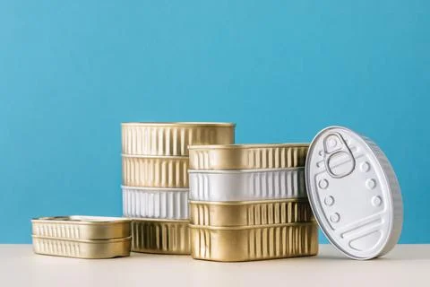 Set of stacked unopened cans Stock Photos