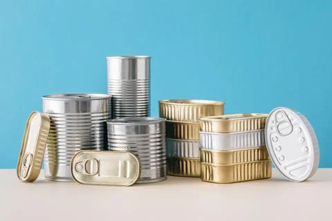 Set of stacked unopened cans Stock Photos