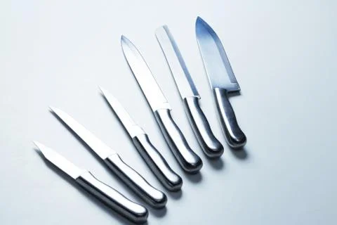 Set of steel kitchen knives, isolated Stock Photos