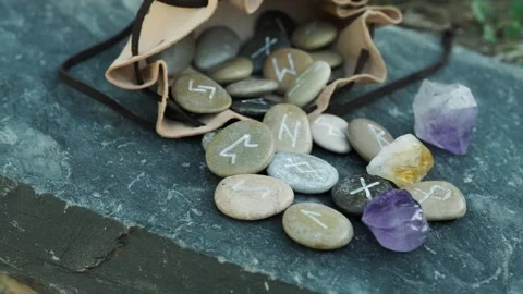A set of stone runes in a bag Stock Footage 336245039