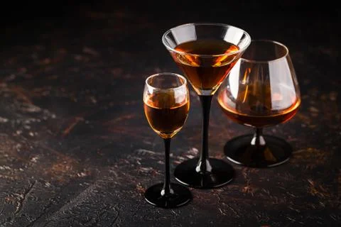Set of strong alcoholic drinks in glasses Stock Photos