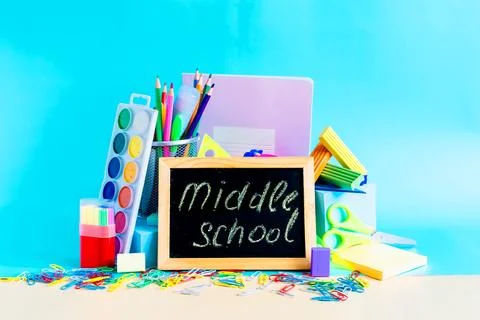 A set of subjects for study and creativity and the inscription "middle school" Stock Photos