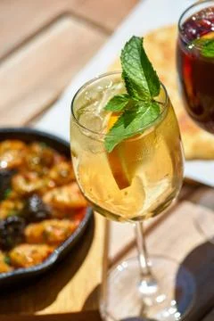 Set of summer refreshments, three glasses of yellow lemonade. Bright sunny da Stock Photos