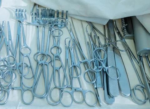 A set of surgical instruments during surgery. Stock Photos