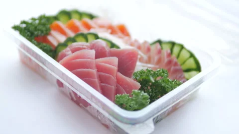 Set of sushi in a plastic box, delivered home ready to eat fast healthy food, Stock Footage 155052083