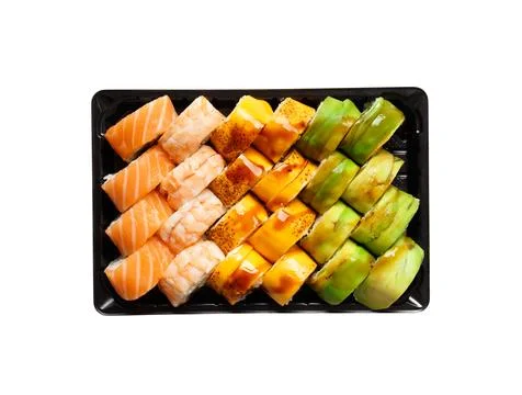 Set of sushi rolls in plastic packages on a white background, top view. Stock Photos