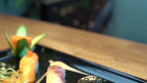 Set of sushi  on wood table. Video stock 106315138