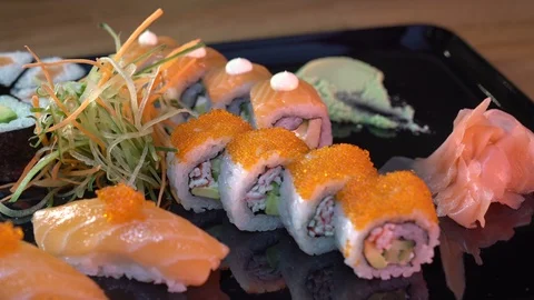 Set of sushi  on wood table. Video stock 106316423