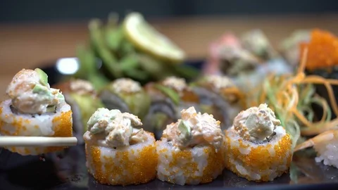 Set of sushi  on wood table. Video stock 106316679