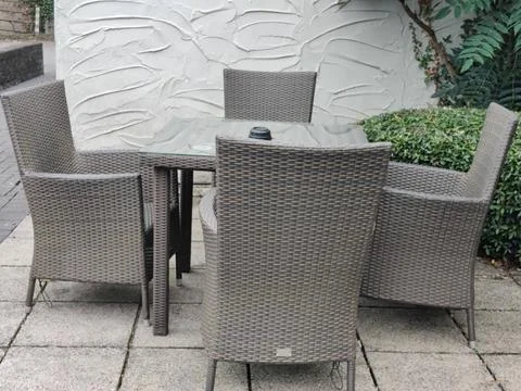 A set of table and chairs Stock Photos