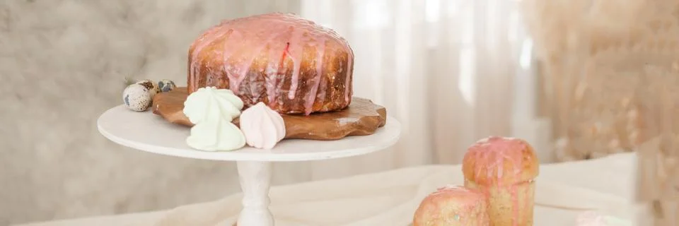 A set table for the celebration of Easter. Cakes and quail eggs on the Easter Stock Photos