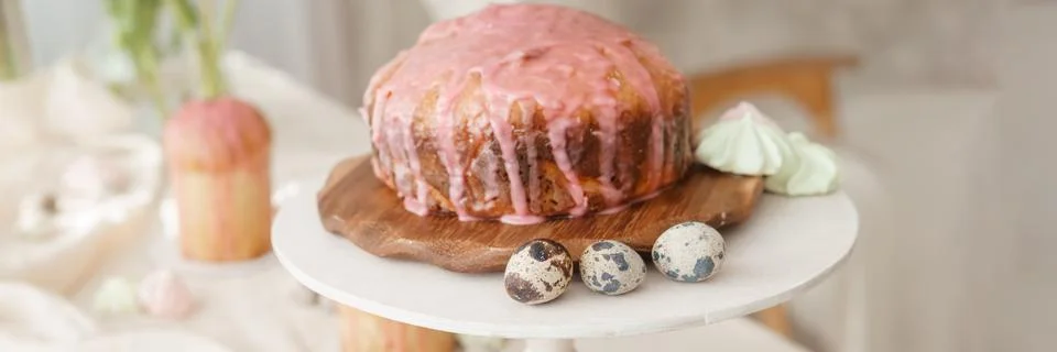 A set table for the celebration of Easter. Cakes and quail eggs on the Easter Stock Photos