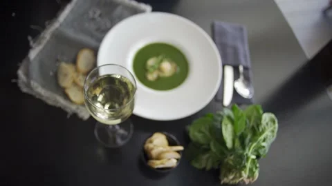 Set table with gourmet high kitchen dinner plates and dishes at the restaurant Stock Footage 303554819
