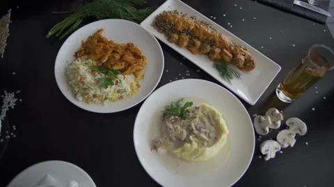Set table with gourmet high kitchen dinner plates and dishes at the restaurant Video stock 303554888