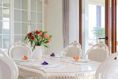 Set table with white plates and wineglasses Stock Photos