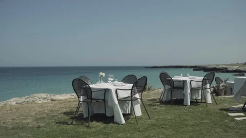 Set tables on sea rocks Stock Footage 86075824