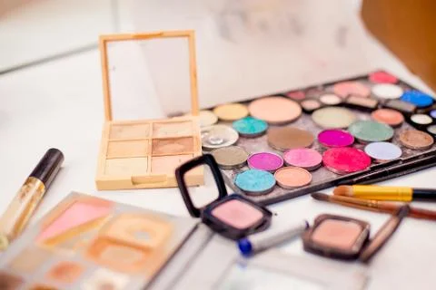 Set of things for makeup: brushes, mascara, eyeliner Stock Photos