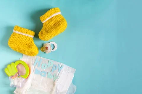 A set of things for a small child on a colored background . Stock Photos