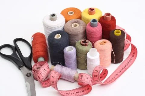 Set of a thread and scissors Stock Photos