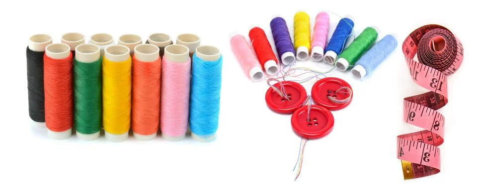 Set of thread spools, buttons and measuring tape isolated on white backgrou.. Stock Photos