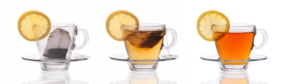 Set of three cups with lemon slice and tea bag isolated on white background Stock Photos