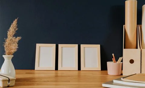 Set of three frames on office desk Stock Photos